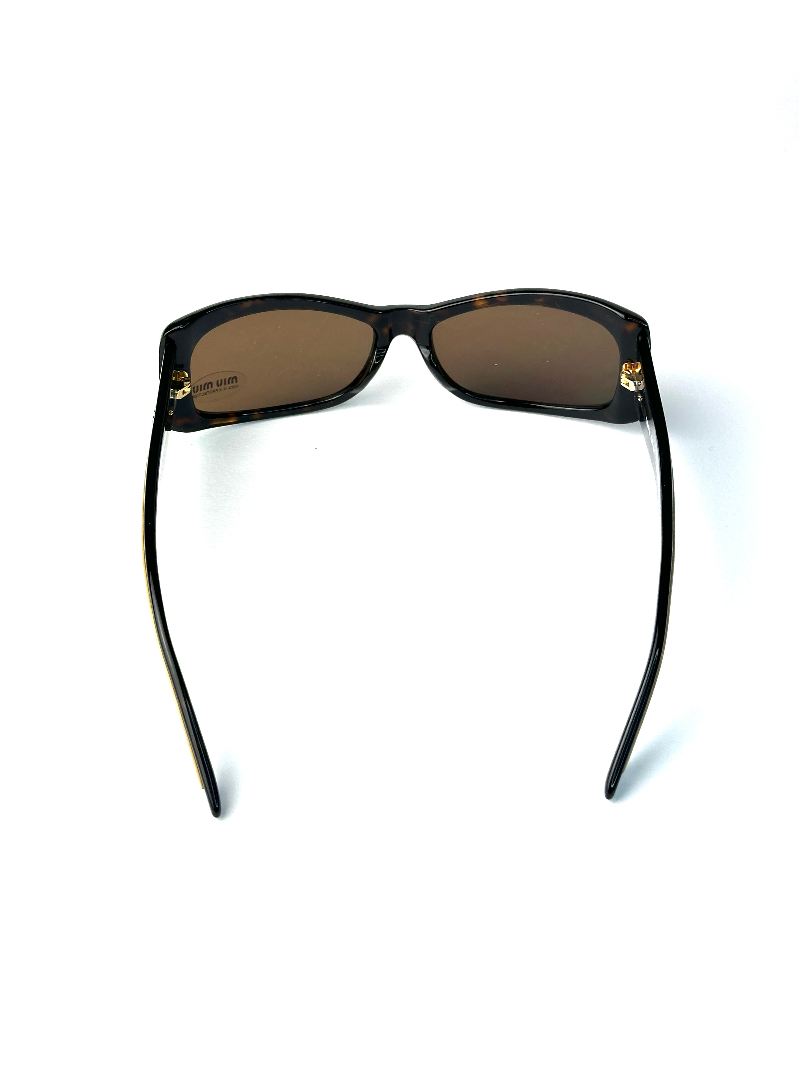 Occhiali da sole MIU MIU SMU17G