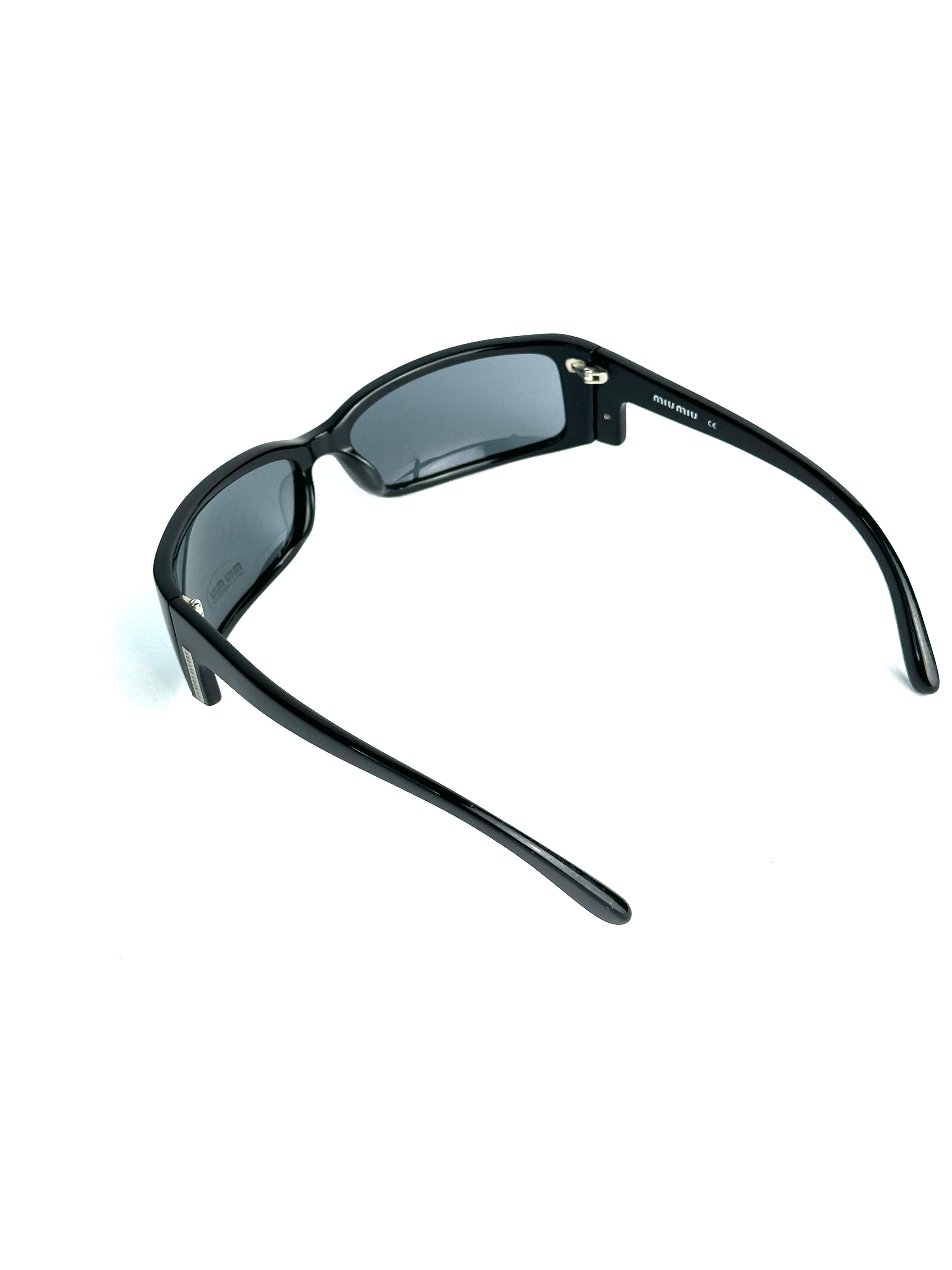 Occhiali da sole MIU MIU SMU04E