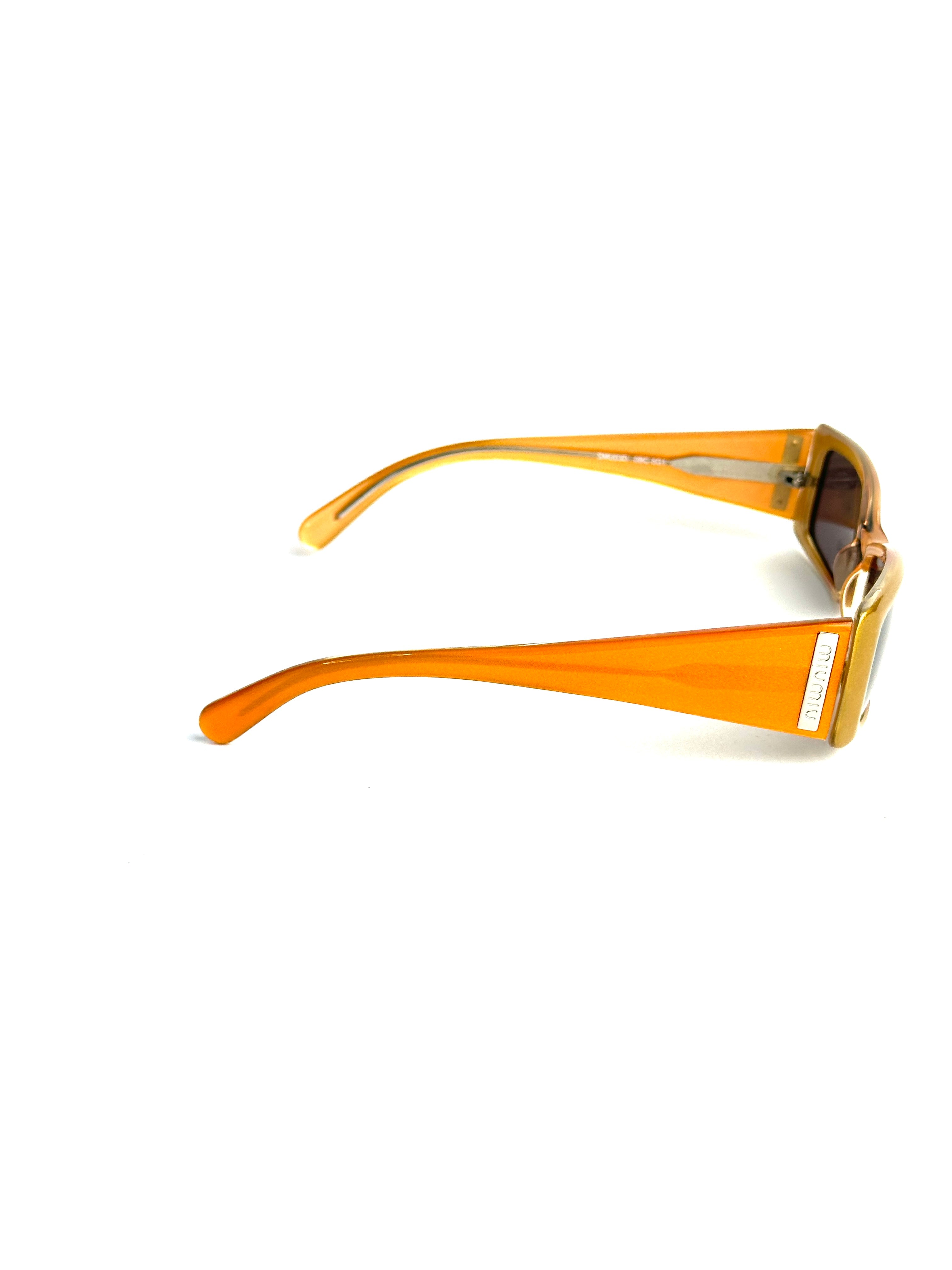 Occhiali da sole MIU MIU SMU03D