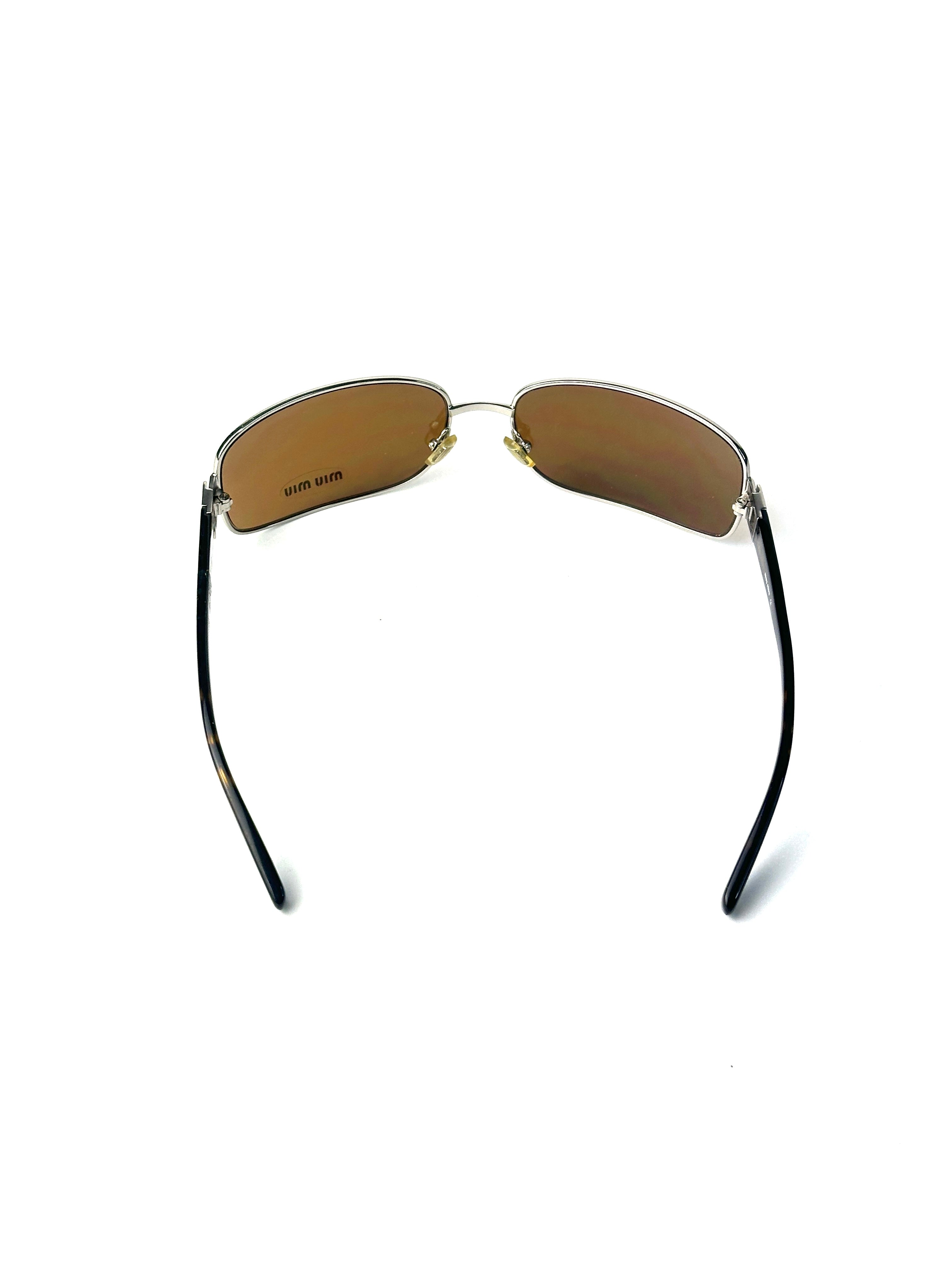 Occhiali da sole MIU MIU SMU59E