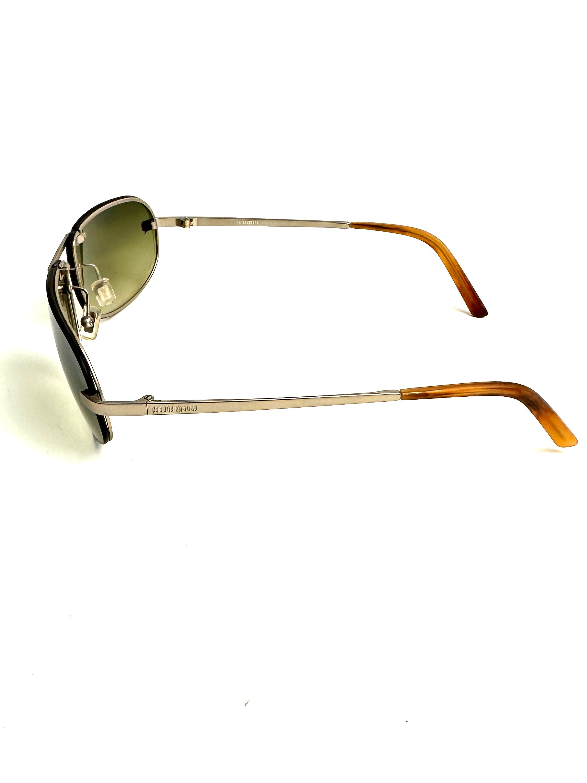 Occhiali da sole MIU MIU SMU52B lente sfumata verde