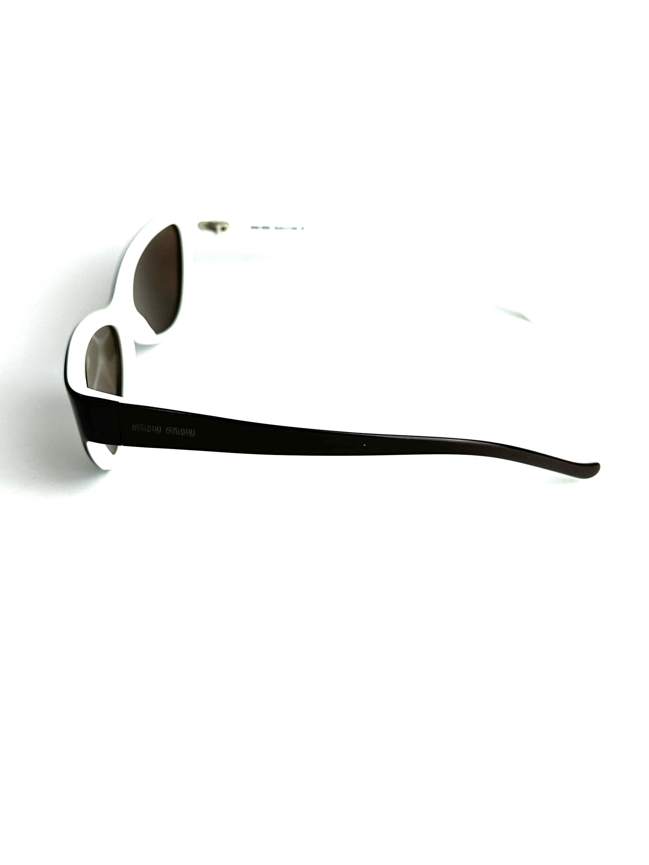 Occhiali da sole MIU MIU SMU09A