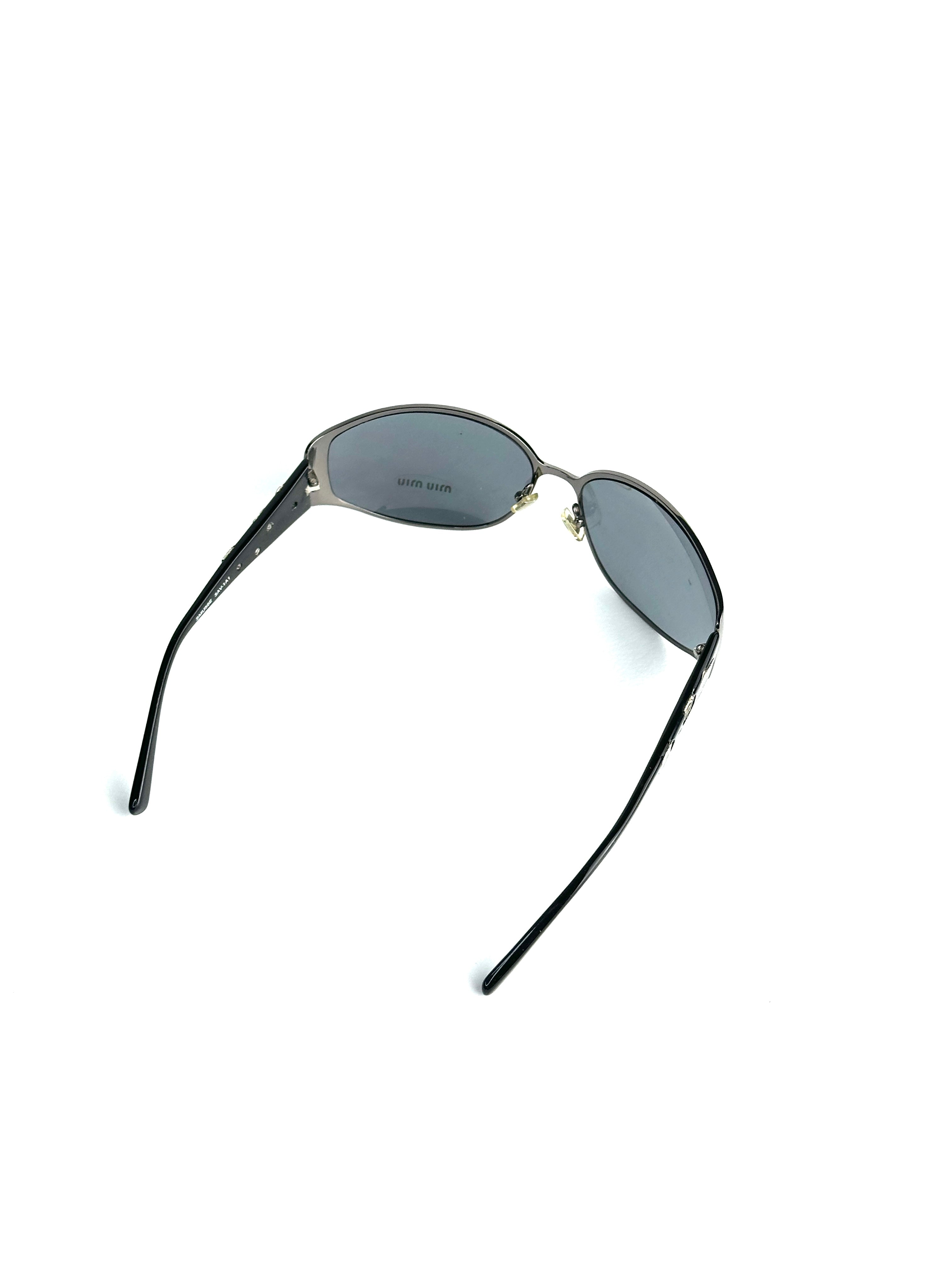 Occhiali da sole MIU MIU SMU56E