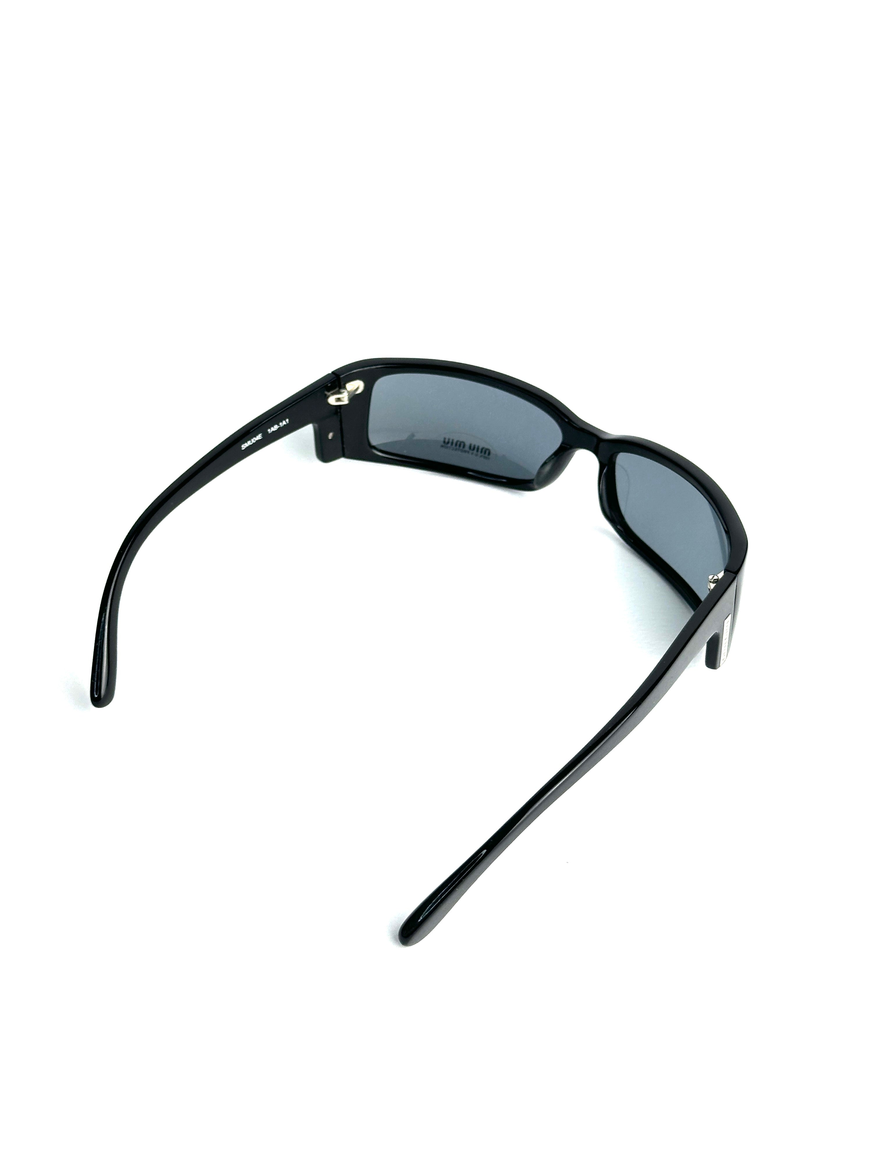 Occhiali da sole MIU MIU SMU04E