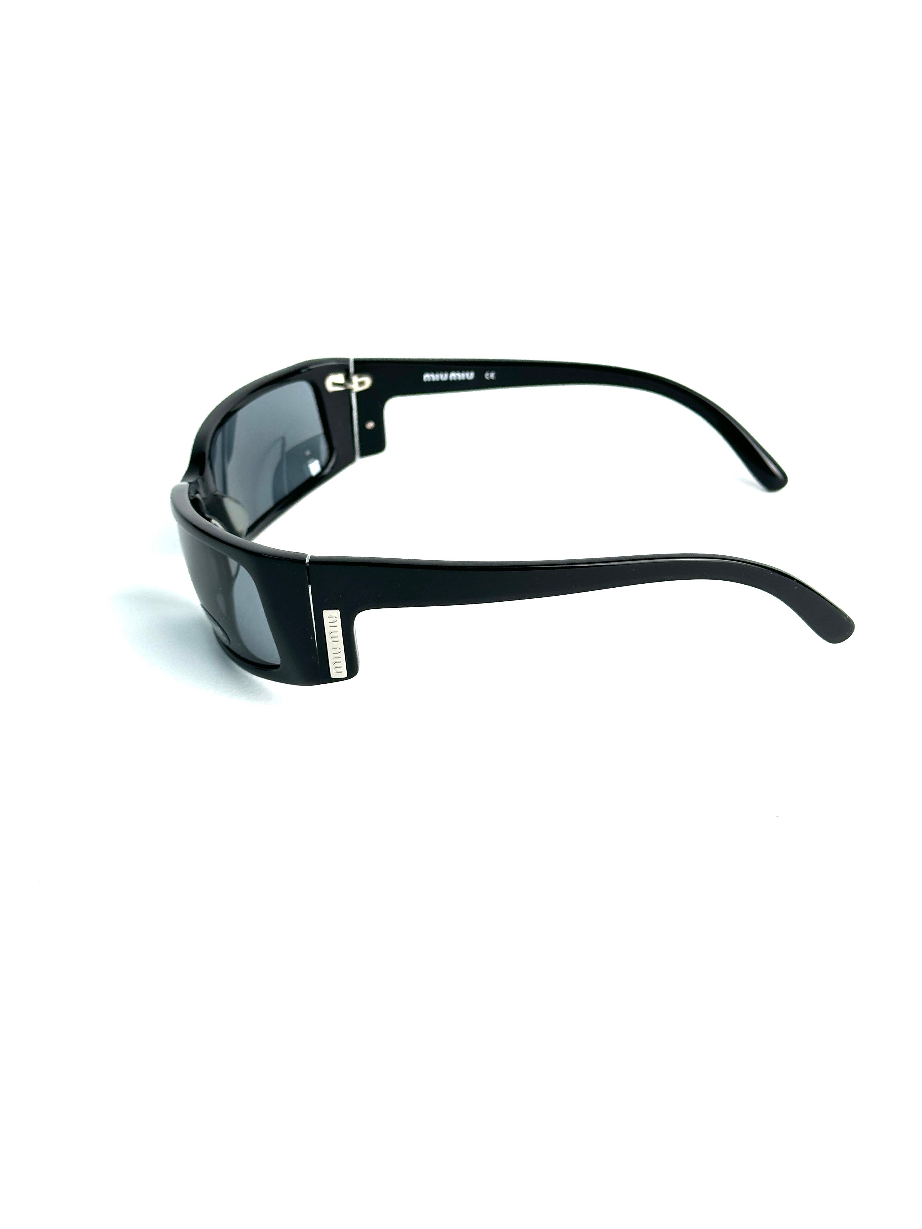 Occhiali da sole MIU MIU SMU04E