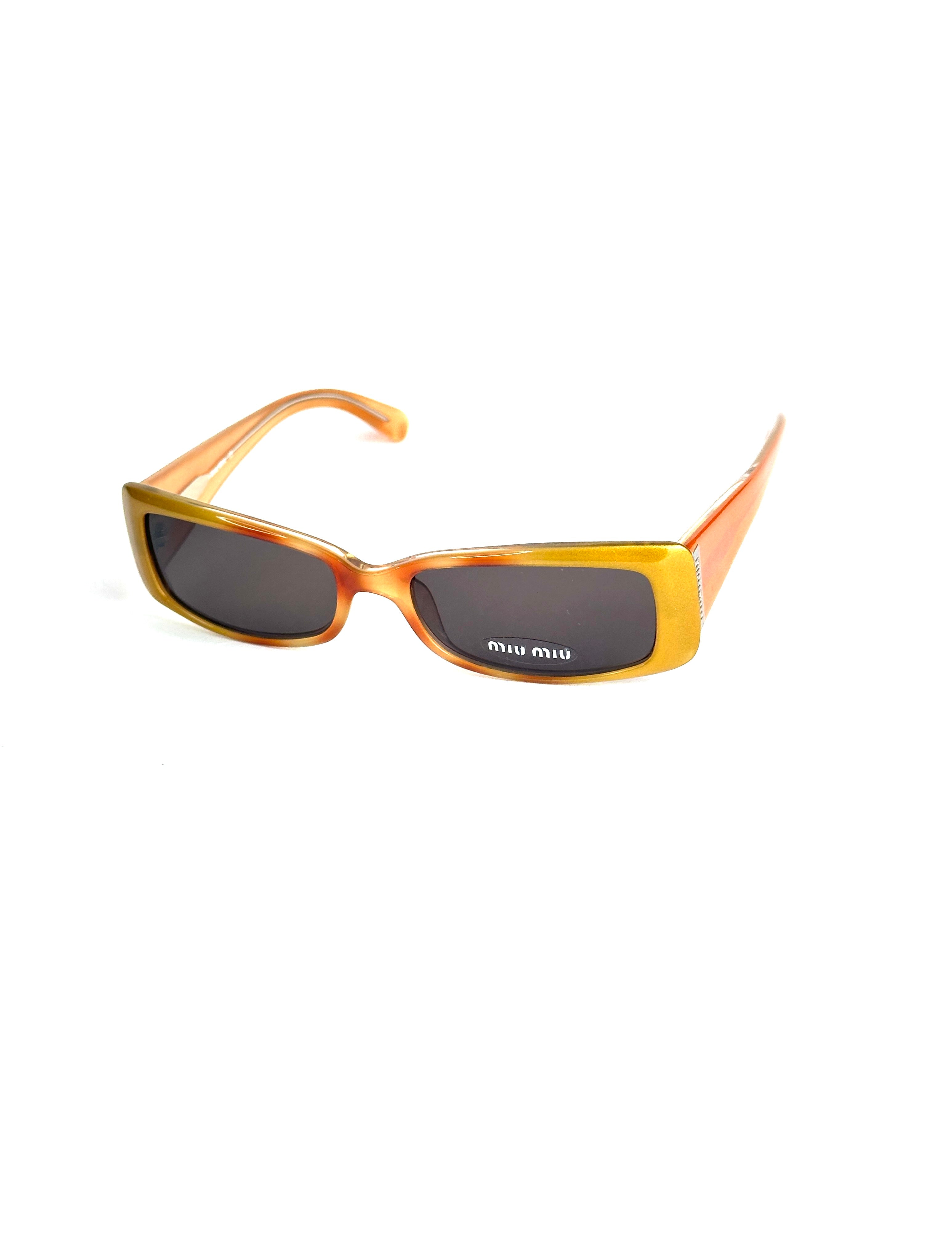 Occhiali da sole MIU MIU SMU03D